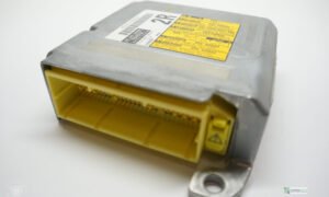 Toyota SRS airbag control module with yellow Denso connector — bench reset at Karman Auto